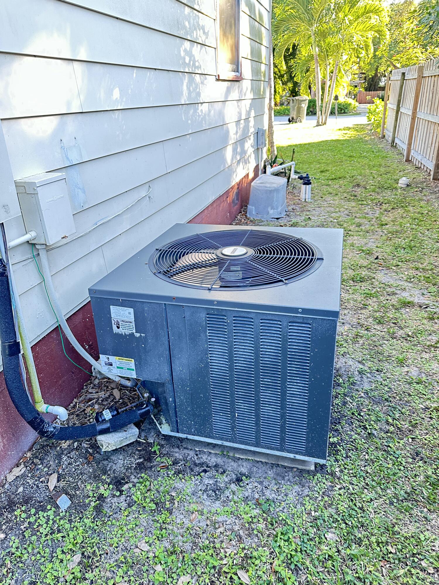 225 Northeast 13th Street Delray Beach, FL 33444 - Photo 12 of 23 a view of backyard with wooden fence
