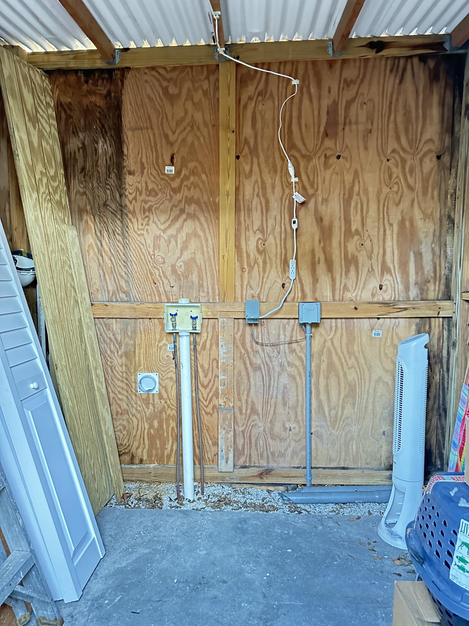 225 Northeast 13th Street Delray Beach, FL 33444 - Photo 13 of 23 a view of walk in closet with clothes