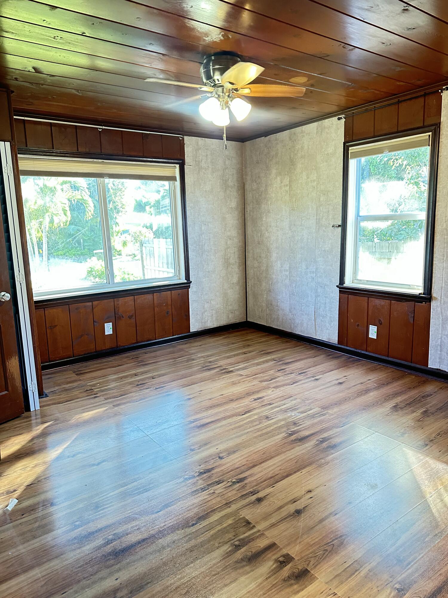 225 Northeast 13th Street Delray Beach, FL 33444 - Photo 22 of 23 a view of empty room with wooden floor and fan