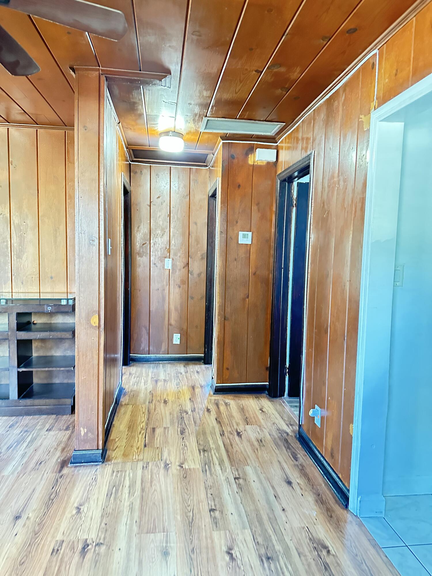 225 Northeast 13th Street Delray Beach, FL 33444 - Photo 8 of 23 a view of room with wooden floor and stairs