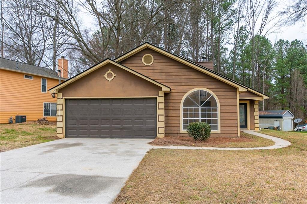 3010 Oakvale Heights Decatur, GA 30034 - Photo 1 of 1 a front view of a house with garden
