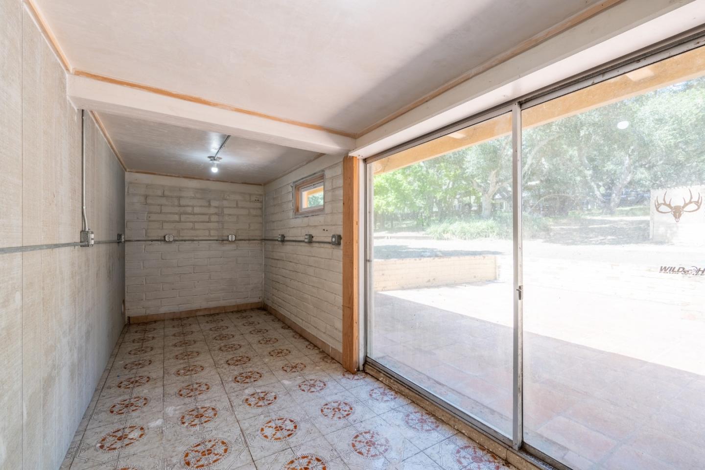 72 Los Laureles Grade Road Carmel Valley, CA 93924 - Photo 25 of 43 a bathroom with a glass shower door