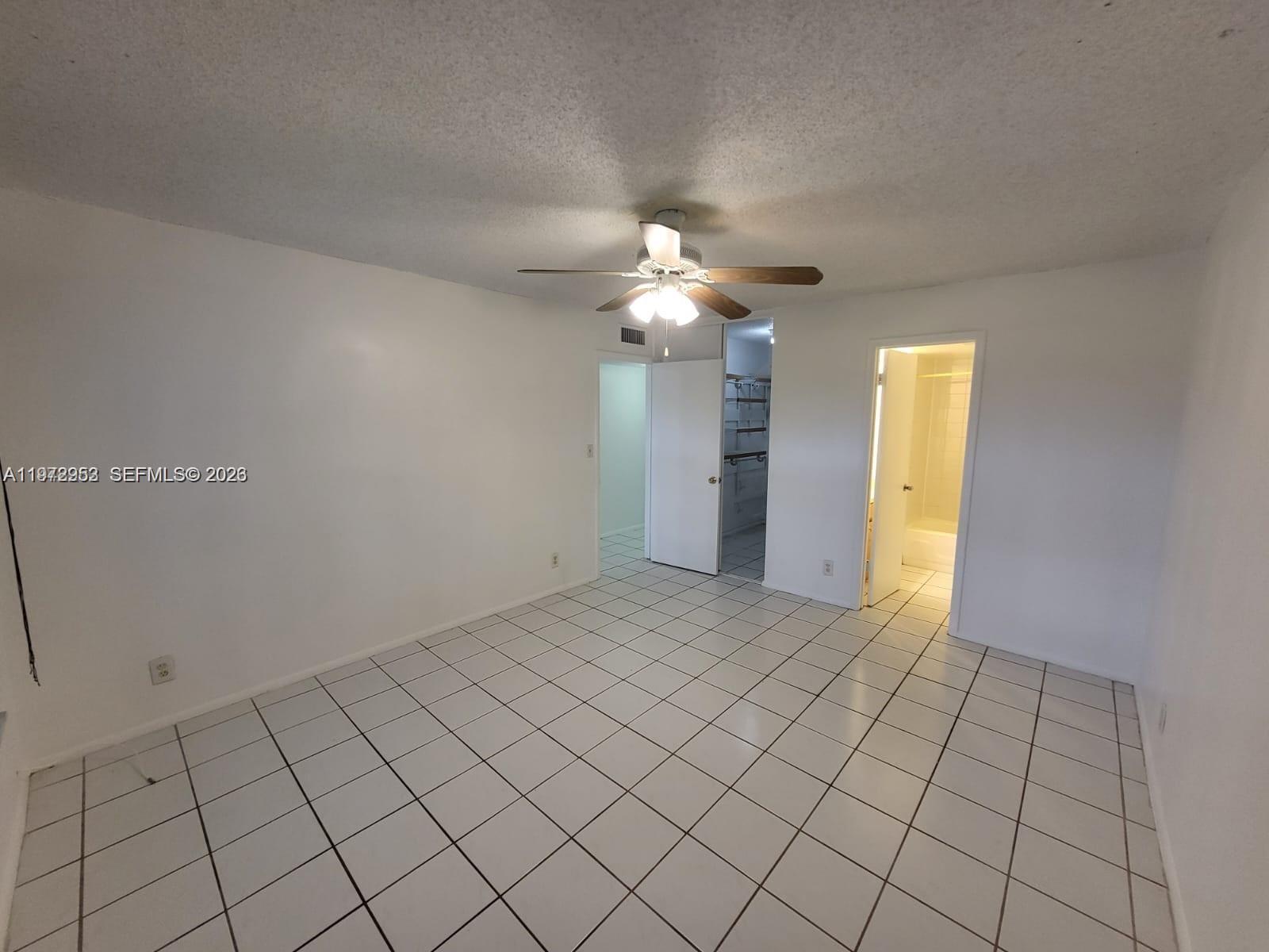 455 South Pine Island Road, Unit 410C Plantation, FL 33324 - Photo 13 of 35 a view of an empty room and window