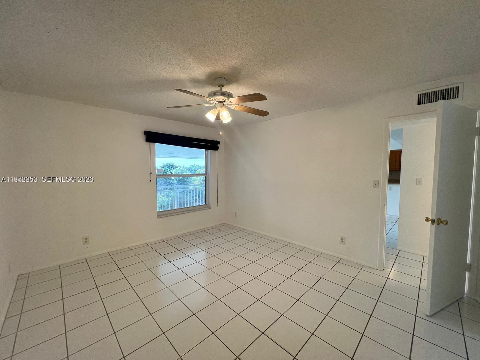 455 South Pine Island Road, Unit 410C Plantation, FL 33324 - Photo 18 of 35 a view of an empty room and window