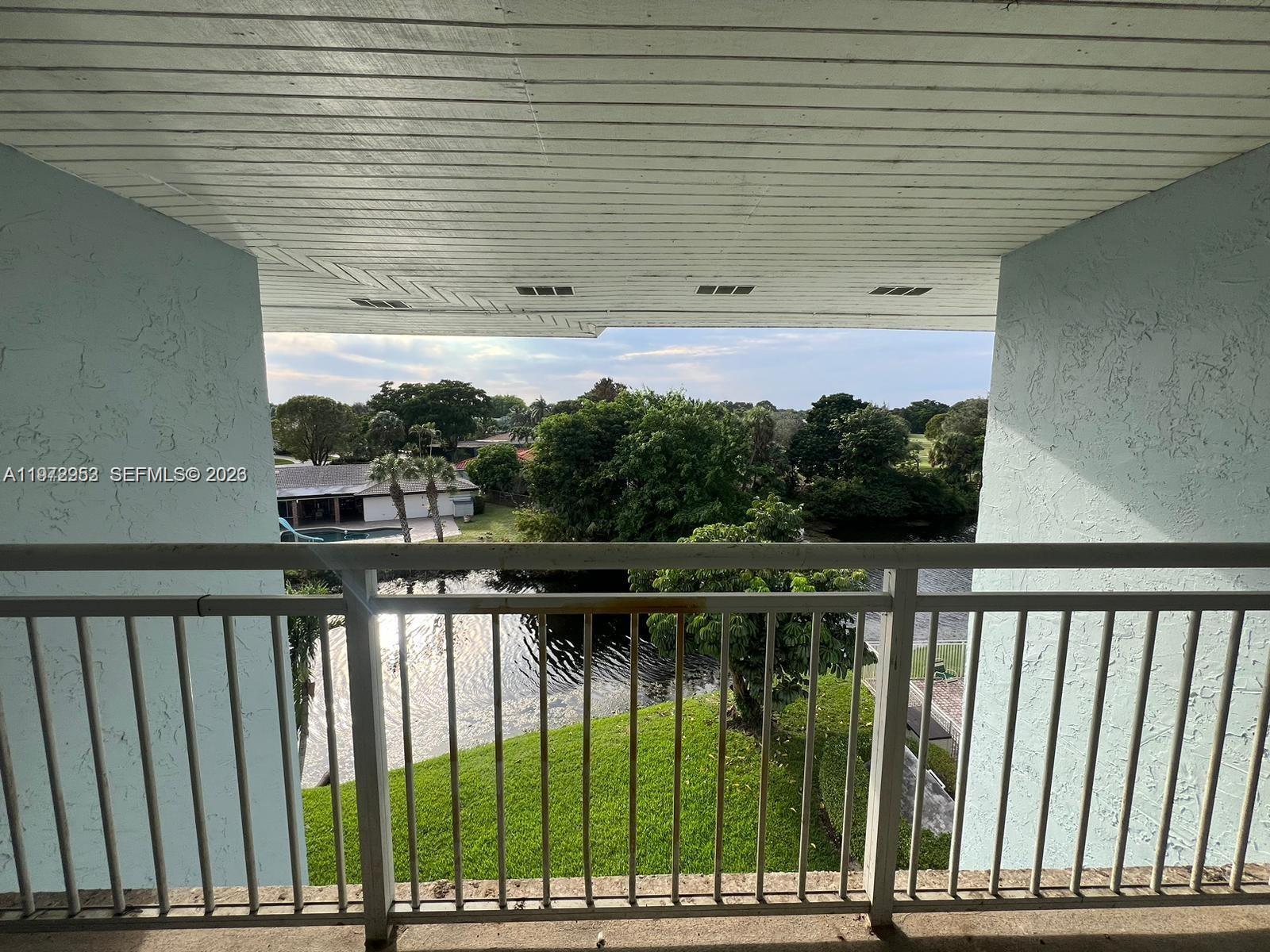 455 South Pine Island Road, Unit 410C Plantation, FL 33324 - Photo 20 of 35 a view of swimming pool from a balcony
