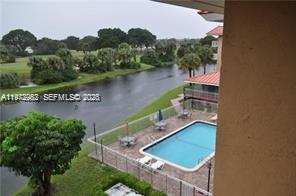 455 South Pine Island Road, Unit 410C Plantation, FL 33324 - Photo 4 of 35 an aerial view of a house with a yard and lake view