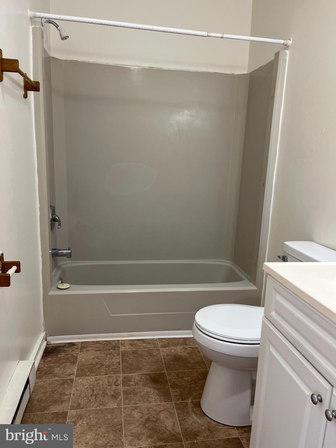 414 North High Street Martinsburg, WV 25404 - Photo 14 of 23 a bathroom with a toilet and a shower
