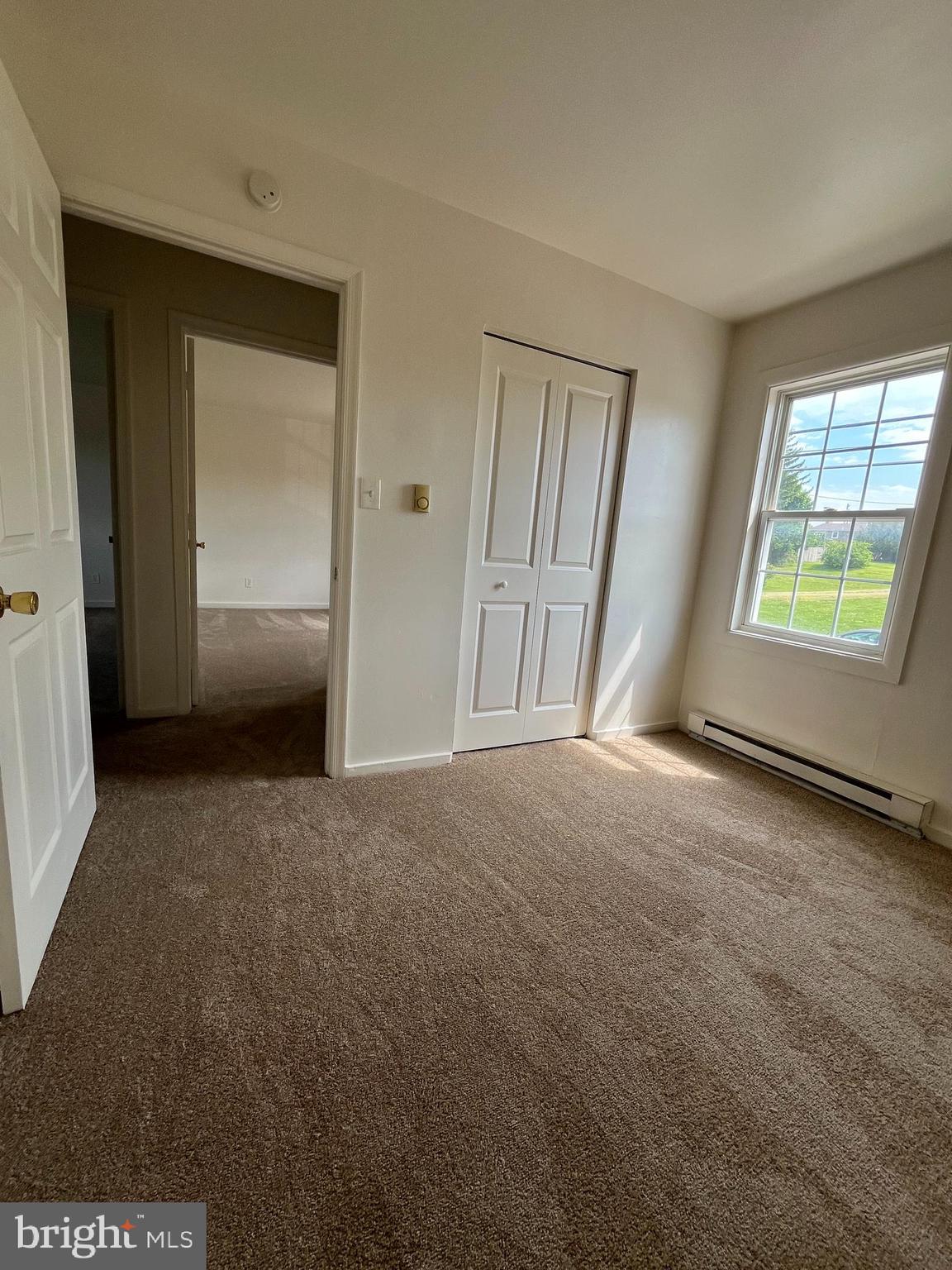 414 North High Street Martinsburg, WV 25404 - Photo 18 of 23 a view of livingroom with hardwood floor and window