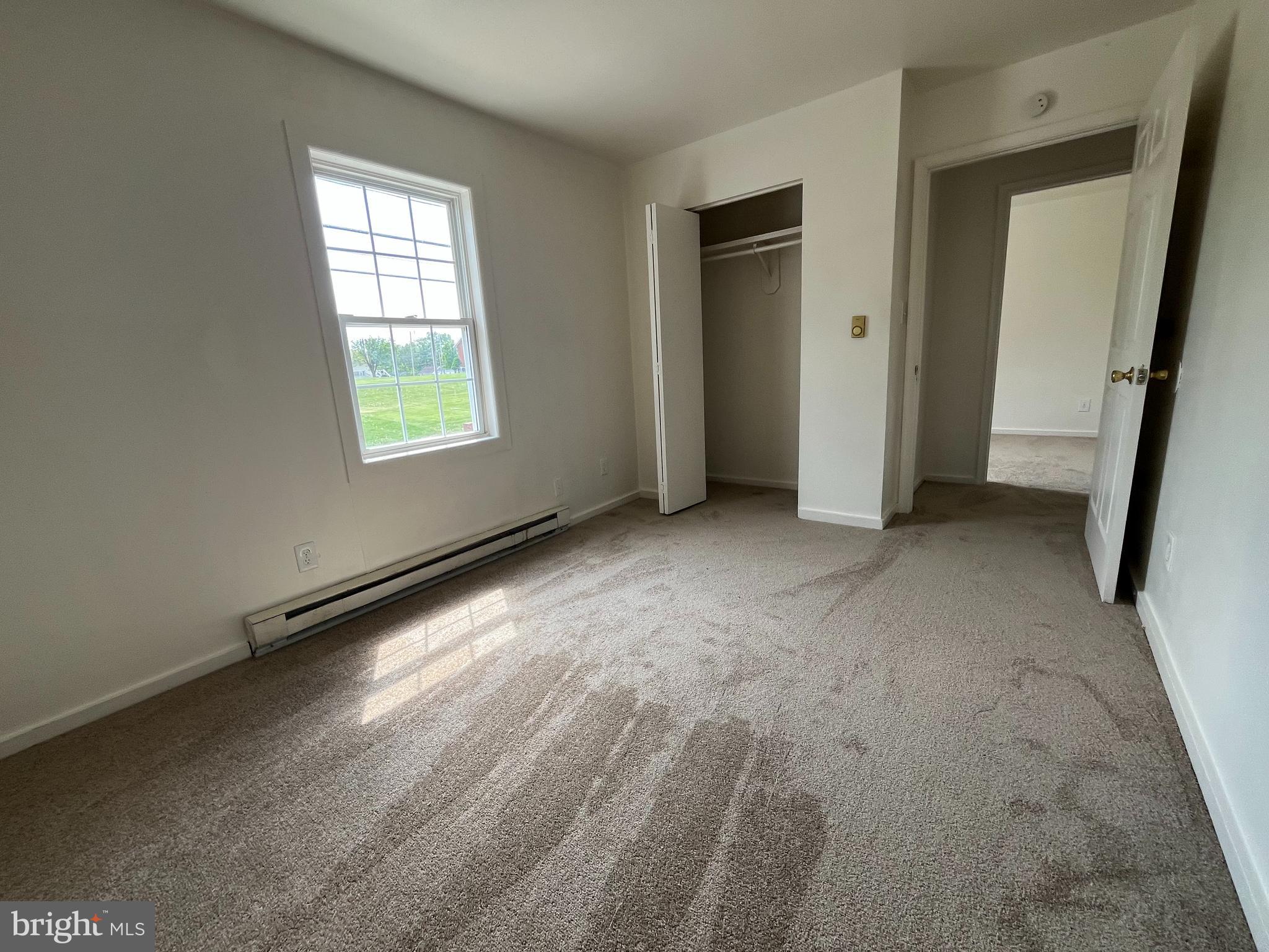 414 North High Street Martinsburg, WV 25404 - Photo 19 of 23 an empty room with windows