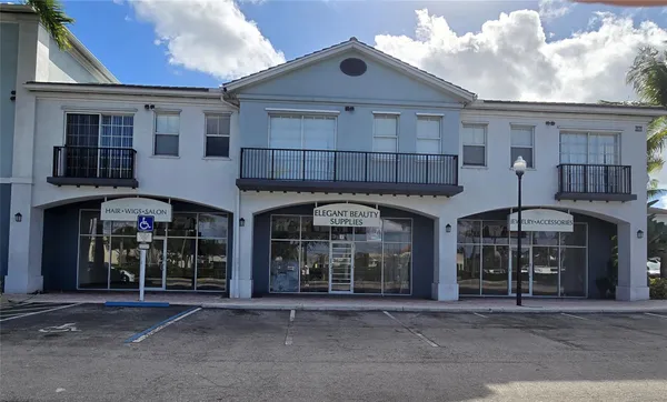 a front view of a building with a glass door