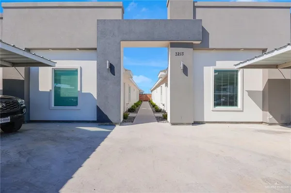 a view of a house with a couches and garage