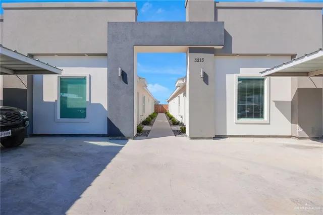 a view of a house with a couches and garage