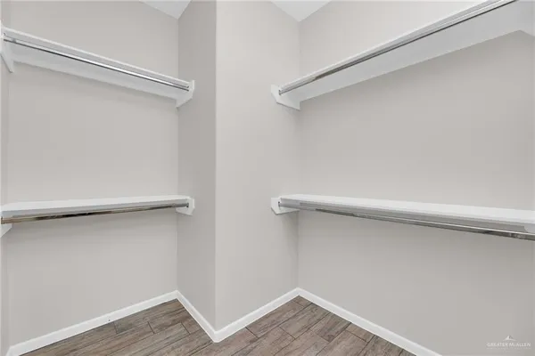 a view of an empty walk in closet