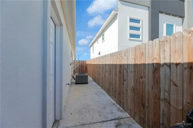 a view of a wooden fence