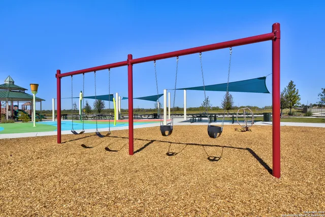 a view of a swimming pool with a slide