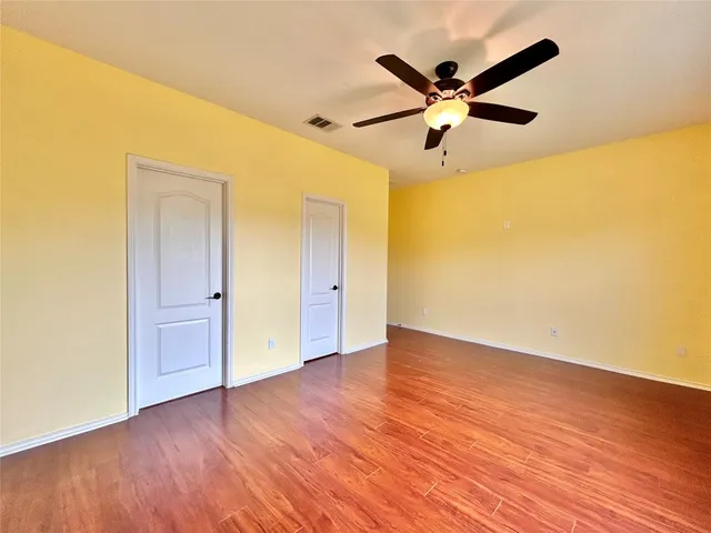 a kitchen with sink cabinets and stainless steel appliances