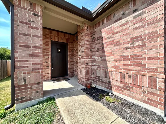 a view of backyard with cabin