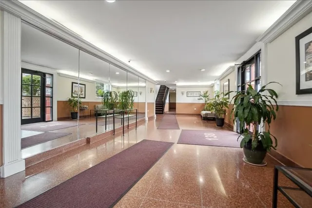 a living room with furniture and a table