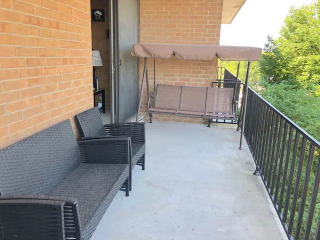 a view of a terrace with chairs