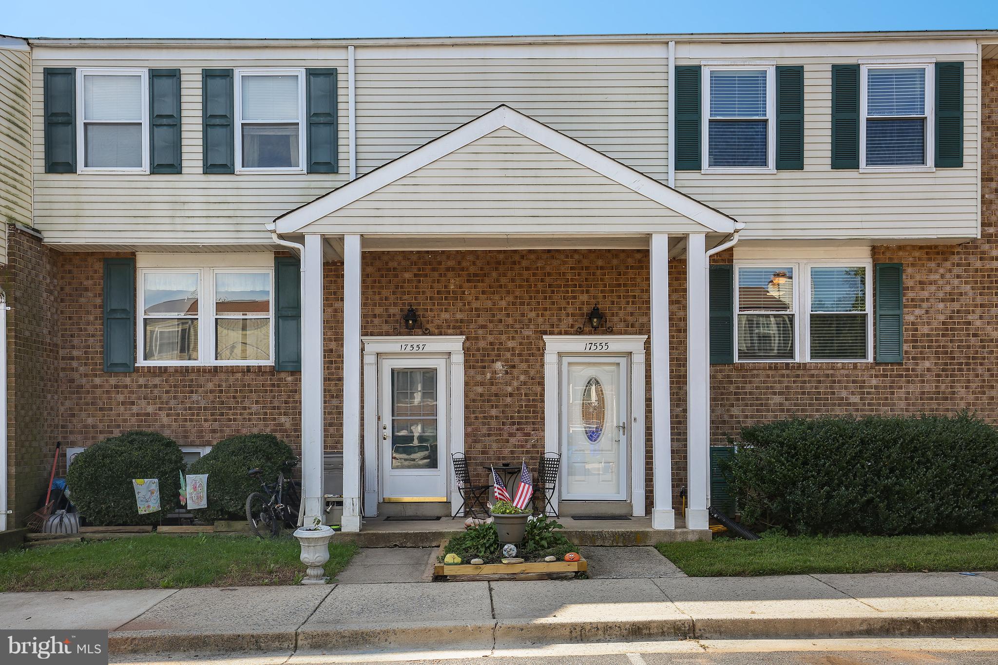 17555 Kohlhoss Road Poolesville, MD 20837 - Photo 1 of 24 a front view of a house with a yard and garage