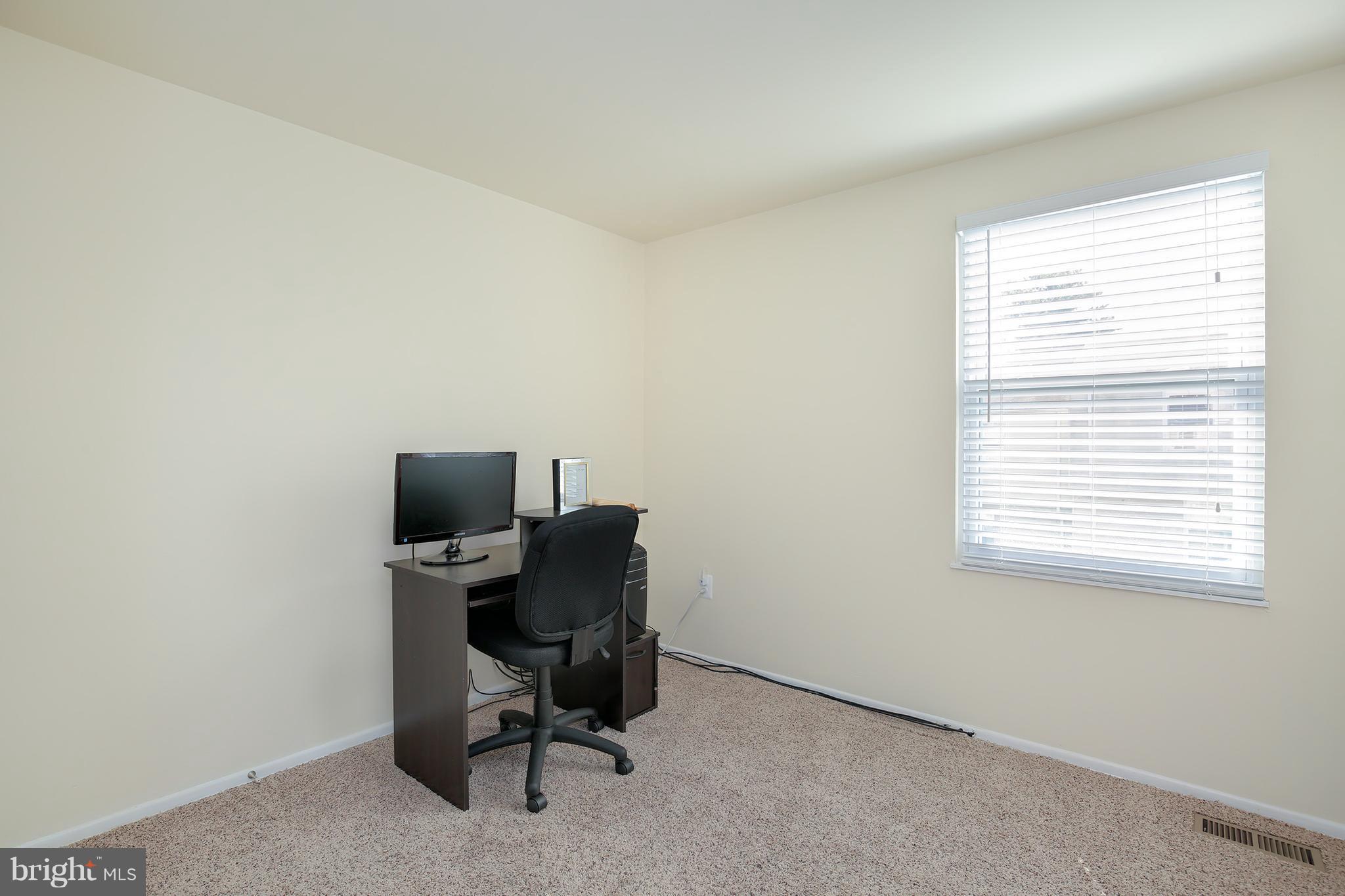 17555 Kohlhoss Road Poolesville, MD 20837 - Photo 14 of 24 a view of a workspace with a window