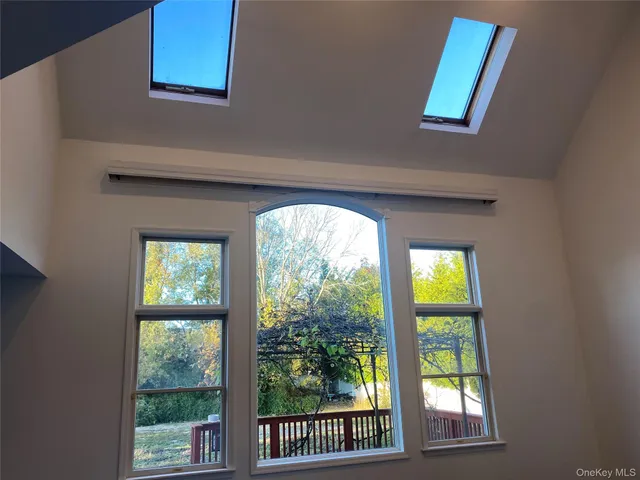 a view of empty room with front door