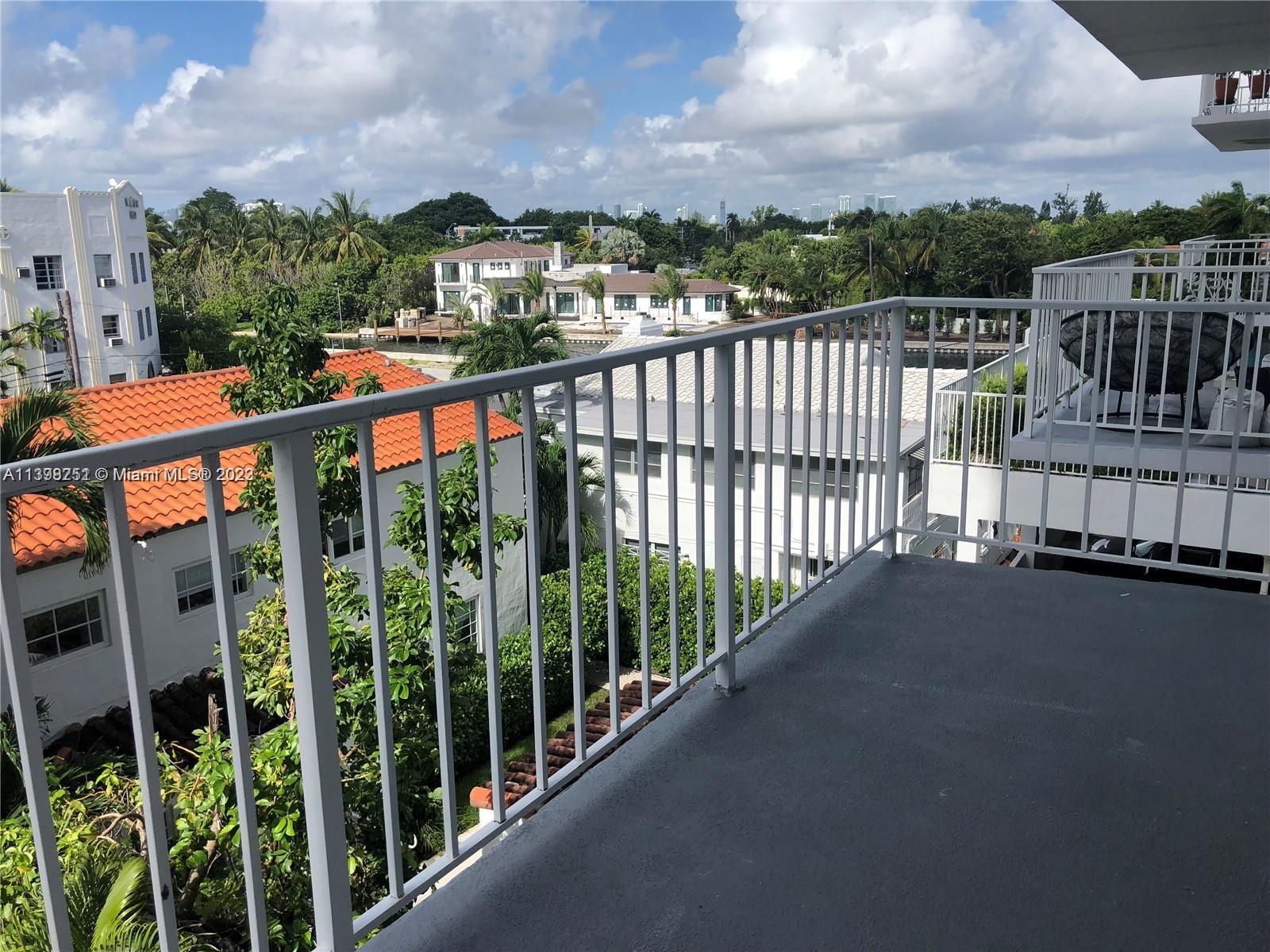 a view of city from a balcony