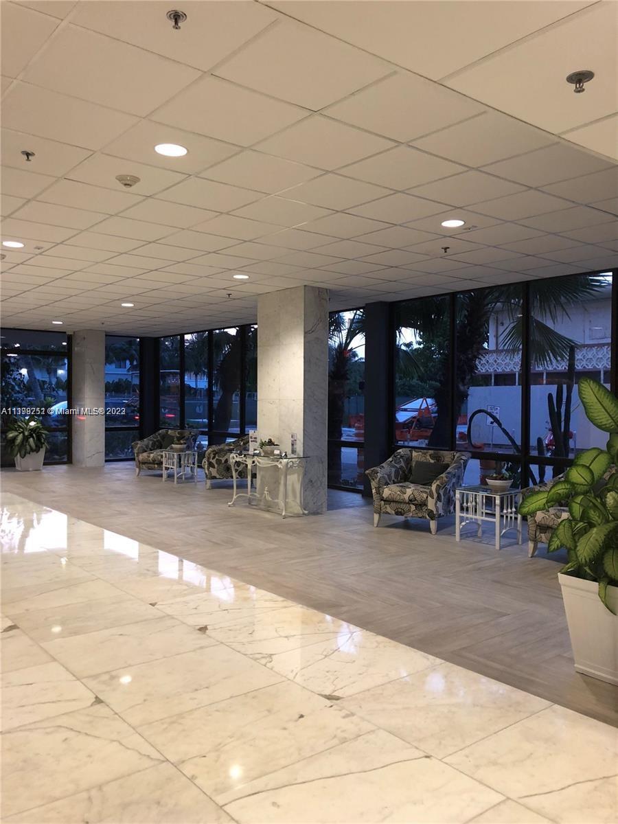 Mid Beach Miami Beach, FL 33140 - Photo 11 of 12 a view of a room with gym equipment