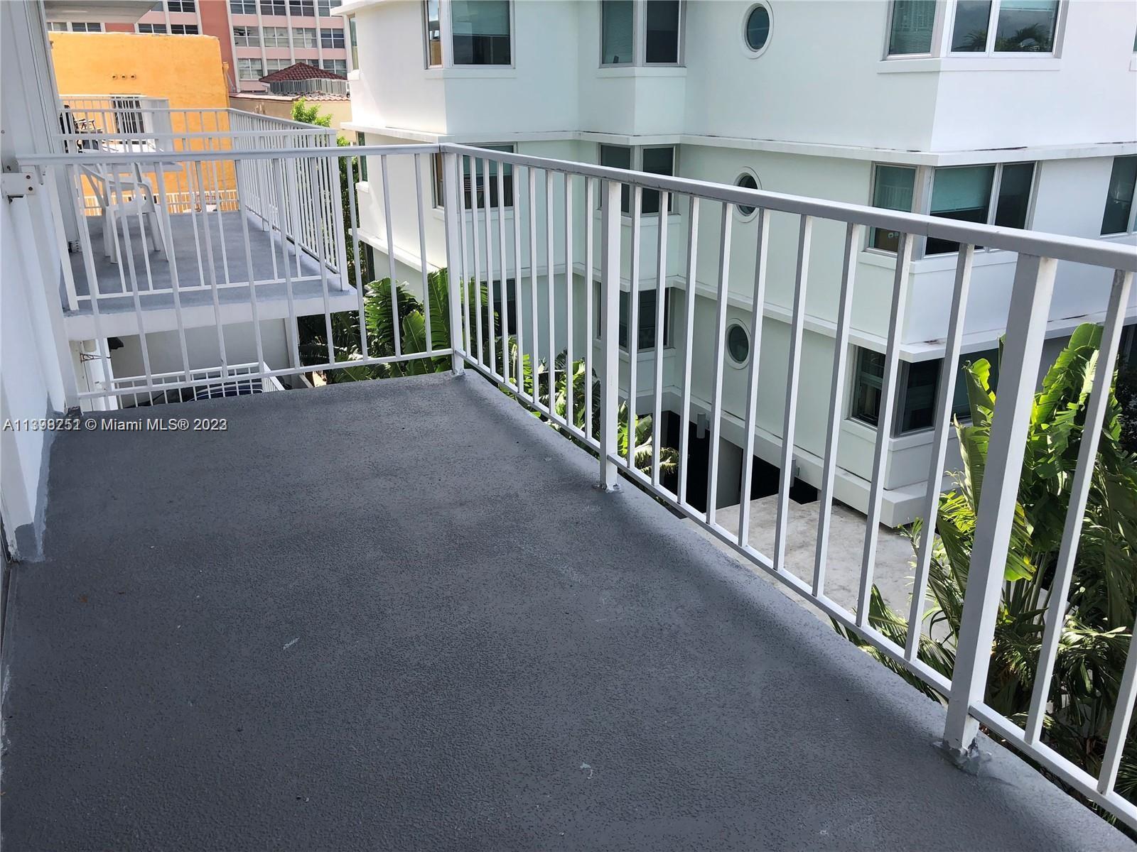 Mid Beach Miami Beach, FL 33140 - Photo 2 of 12 a view of a balcony with stairs