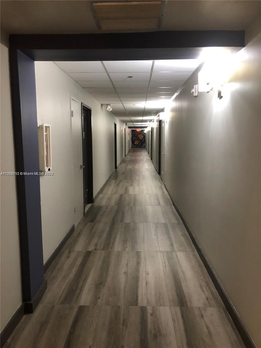 Mid Beach Miami Beach, FL 33140 - Photo 5 of 12 a view of gallery with wooden floor