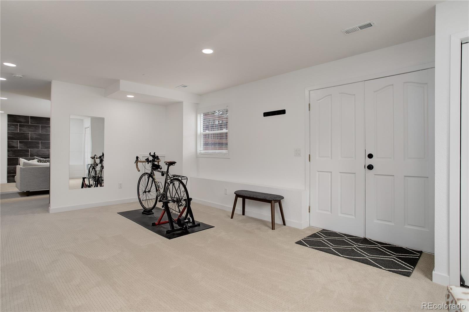 95 Fitzsimmons Road Bailey, CO 80421 - Photo 23 of 38 a view of a room with gym equipment