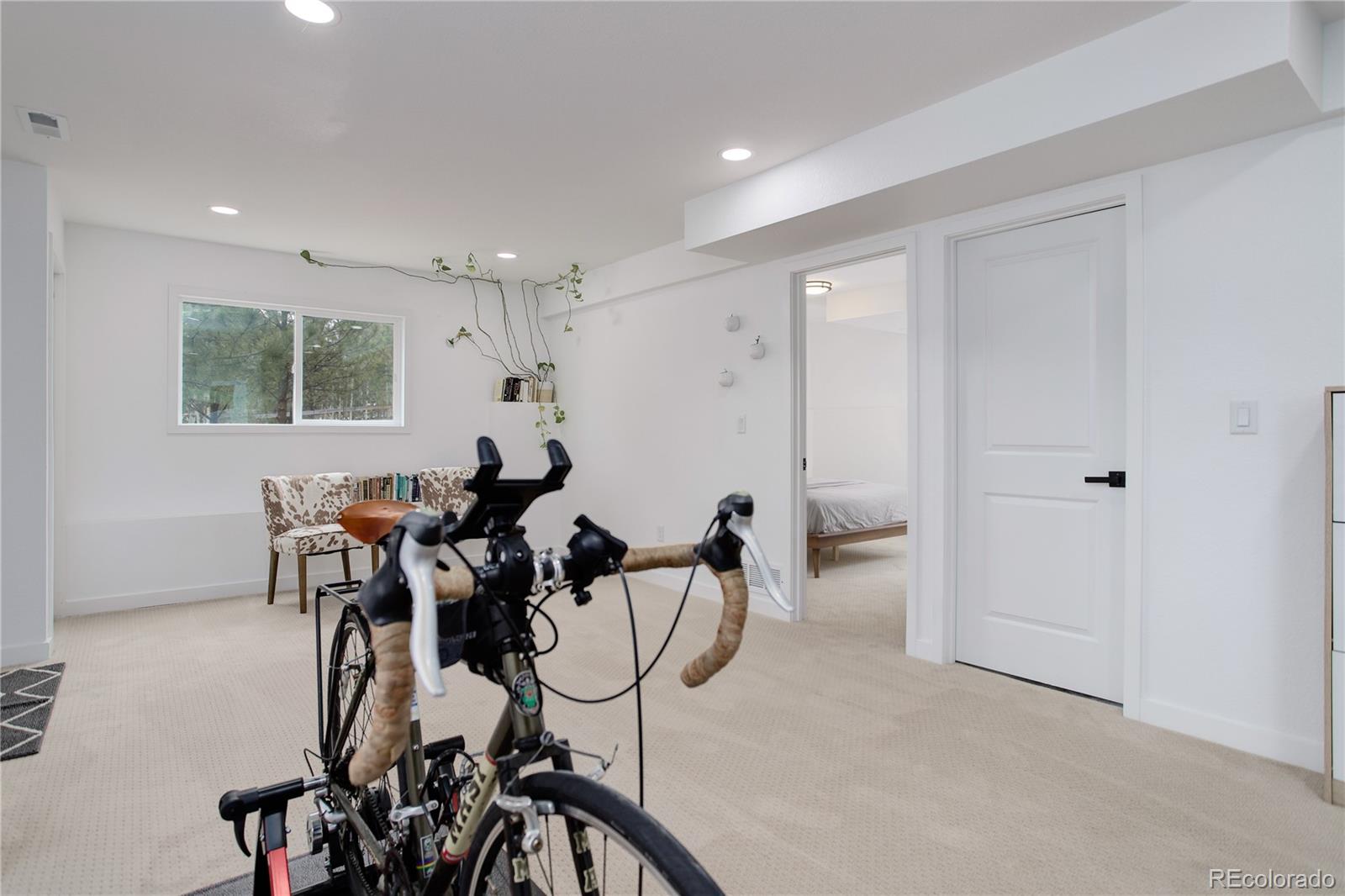 95 Fitzsimmons Road Bailey, CO 80421 - Photo 24 of 38 a view of a room with gym equipment