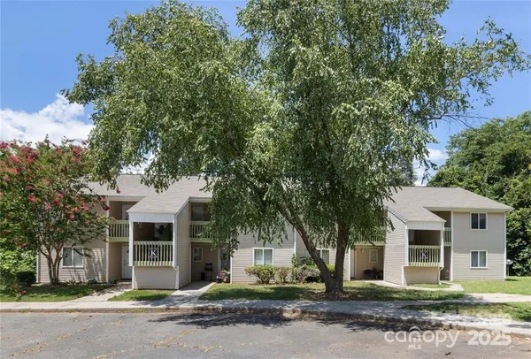 front view of a house with a garden
