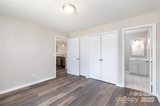 a view of a livingroom with wooden floor