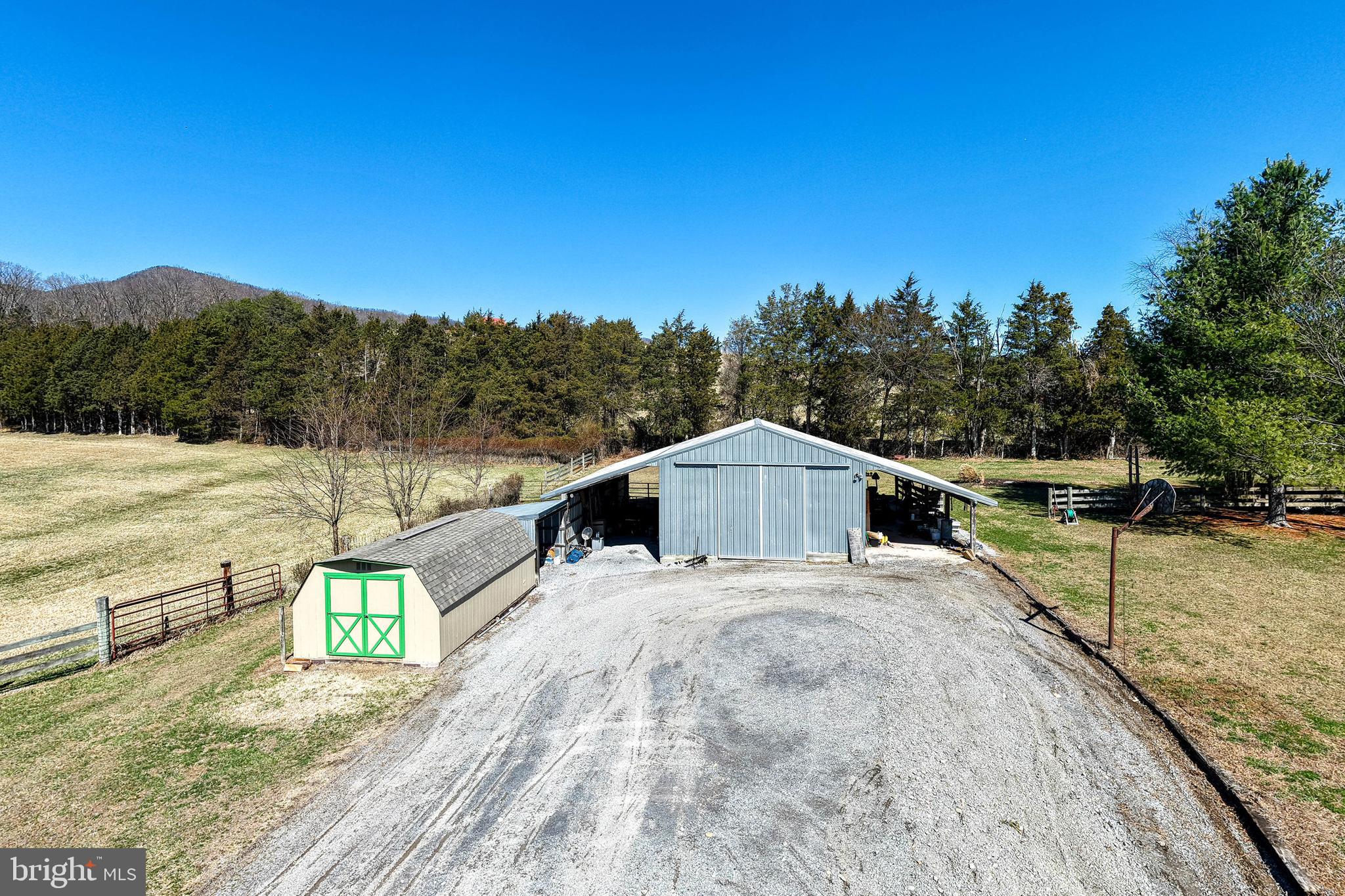2301 South Page Valley Road Luray, VA 22835 - Photo 16 of 66 a view of a house with a yard