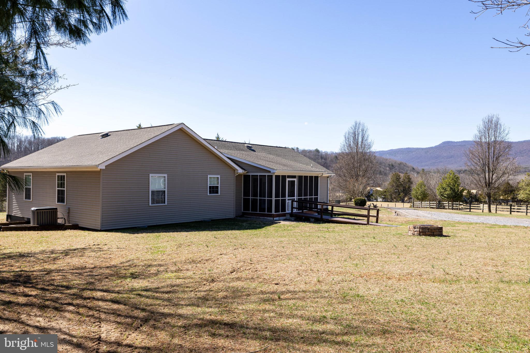 2301 South Page Valley Road Luray, VA 22835 - Photo 29 of 66 a view of a house with a yard and a large tree