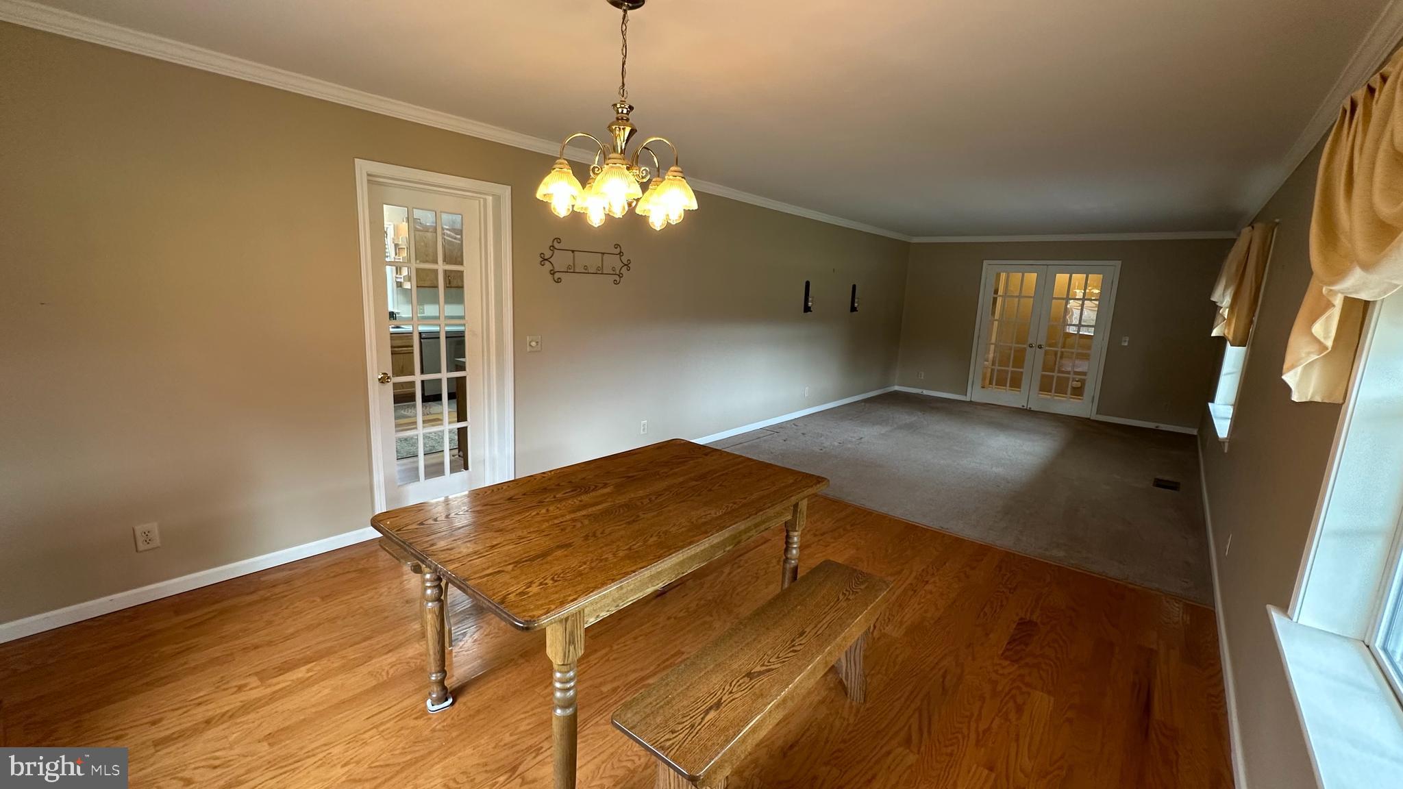 2301 South Page Valley Road Luray, VA 22835 - Photo 36 of 66 a view of a livingroom with a furniture wooden floor and chandelier