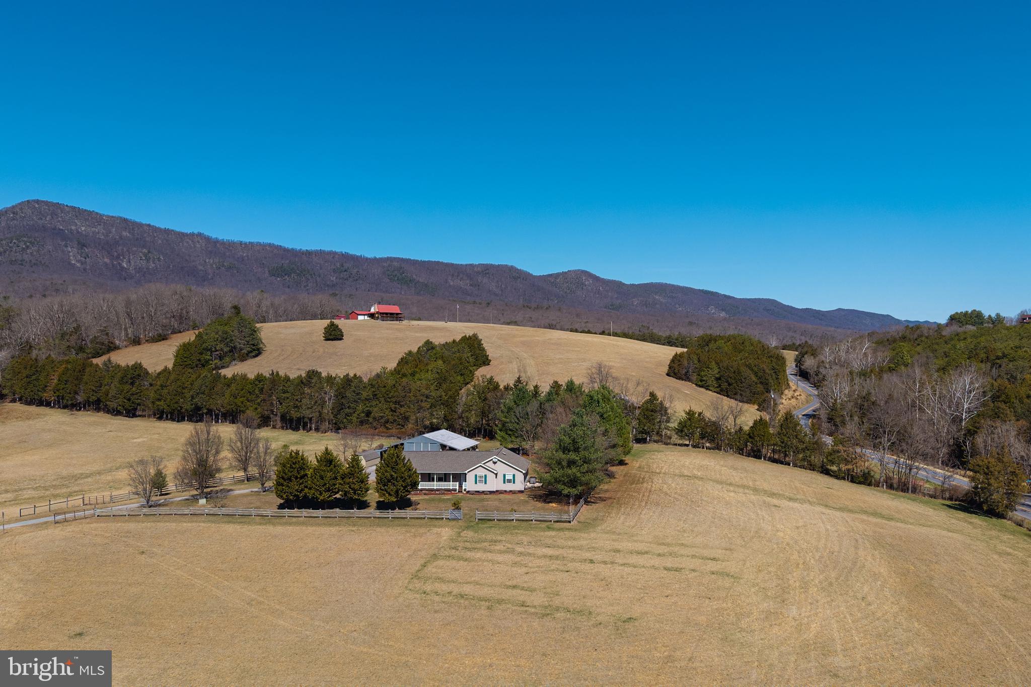 2301 South Page Valley Road Luray, VA 22835 - Photo 5 of 66 a view of a road with a mountain