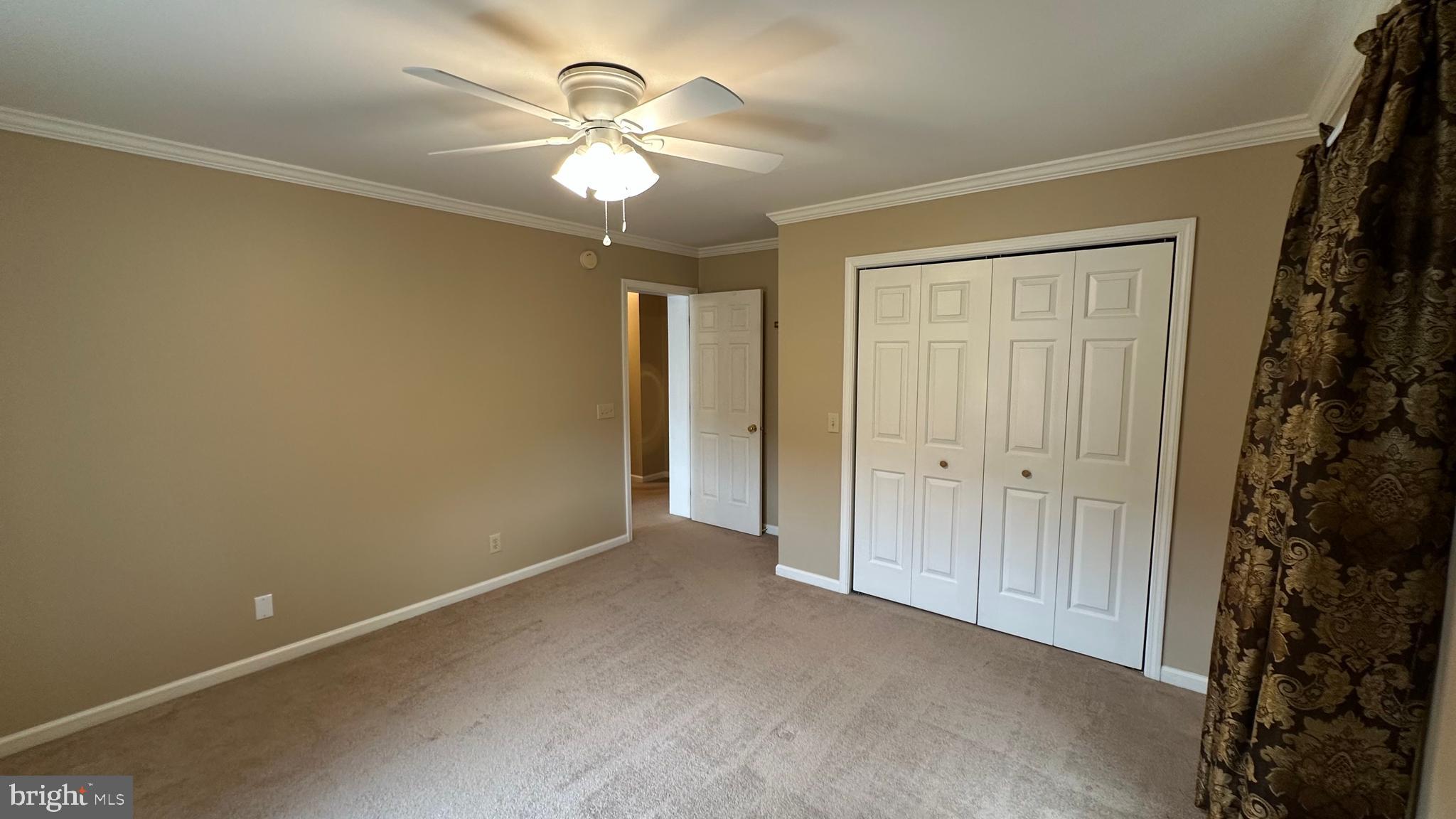 2301 South Page Valley Road Luray, VA 22835 - Photo 54 of 66 a view of an empty room with a chandelier fan
