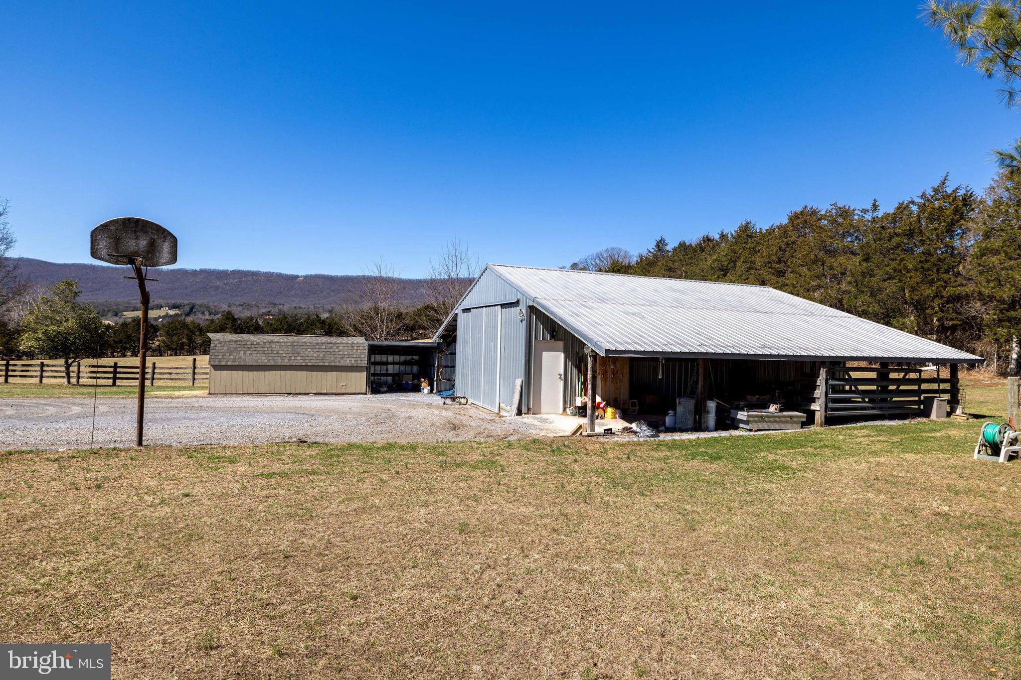 2301 South Page Valley Road Luray, VA 22835 - Photo 58 of 66 a view of a house with large trees