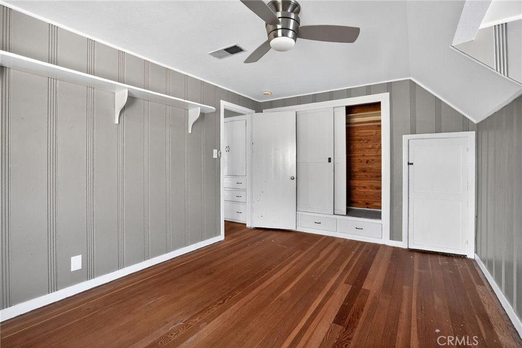 1717 Locust Ravine Bakersfield, CA 93306 - Photo 24 of 29 a view of an empty room with wooden floor