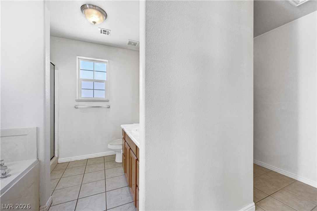 1272 Liston Avenue Logandale, NV 89021 - Photo 37 of 61 A well-lit bathroom provides a window for natural illumination.