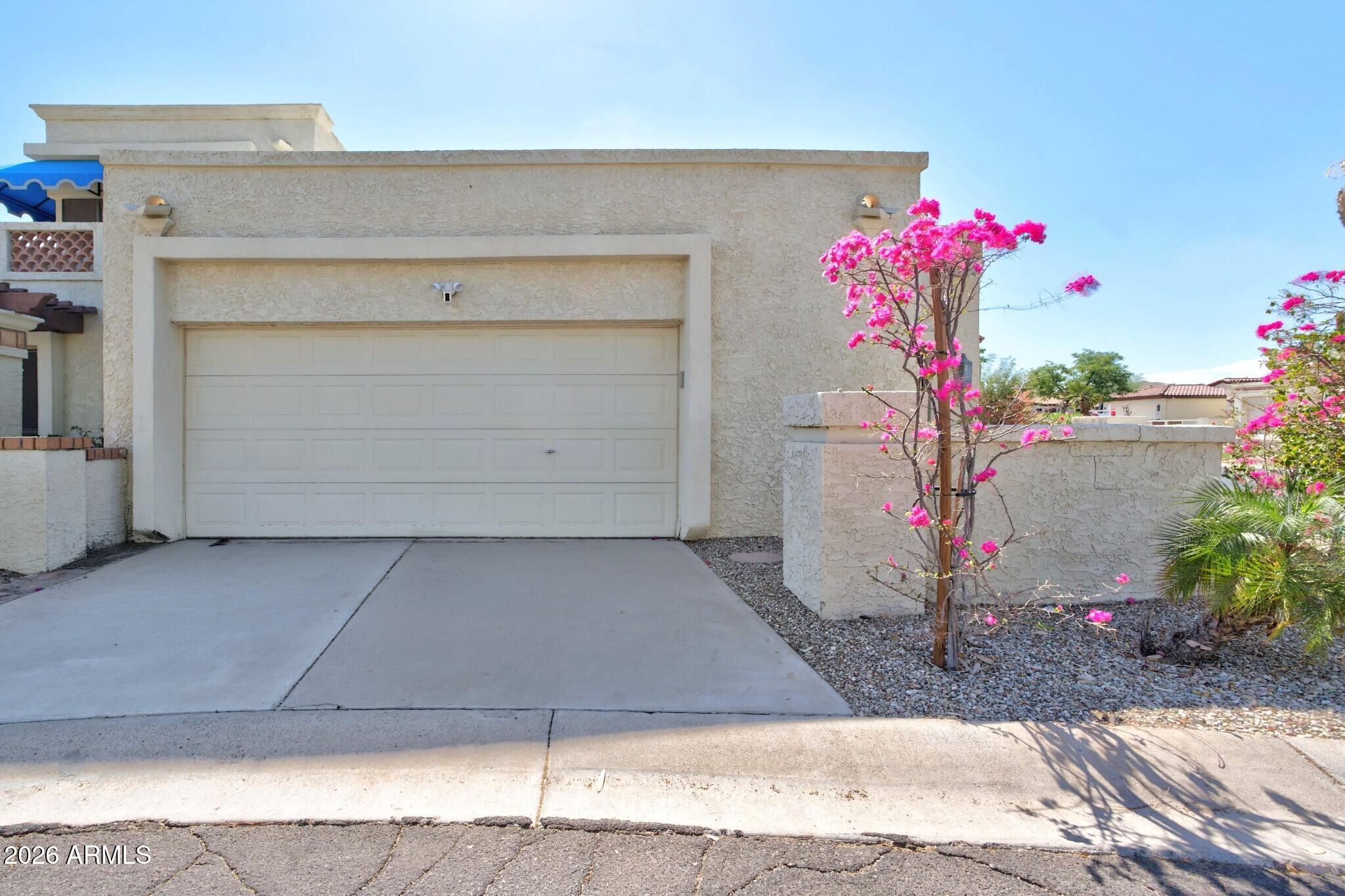 4615 East Monte Way Phoenix, AZ 85044 - Photo 3 of 35 a front view of a house