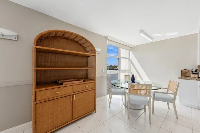 a room with furniture a washer and dryer