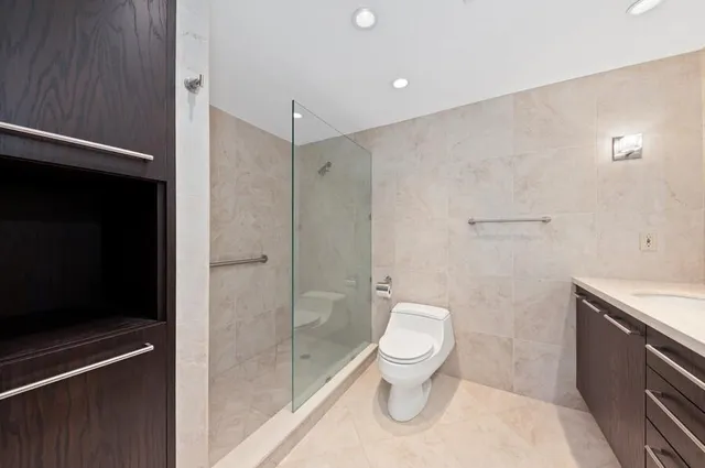 a workspace with furniture and a ceiling fan