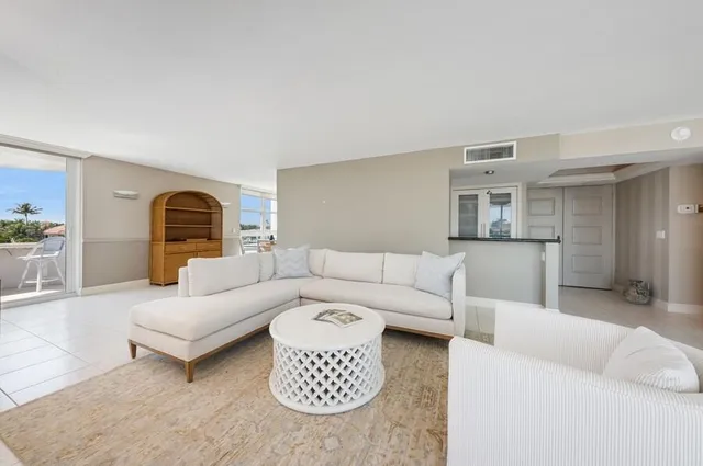 a living room with furniture and a couch