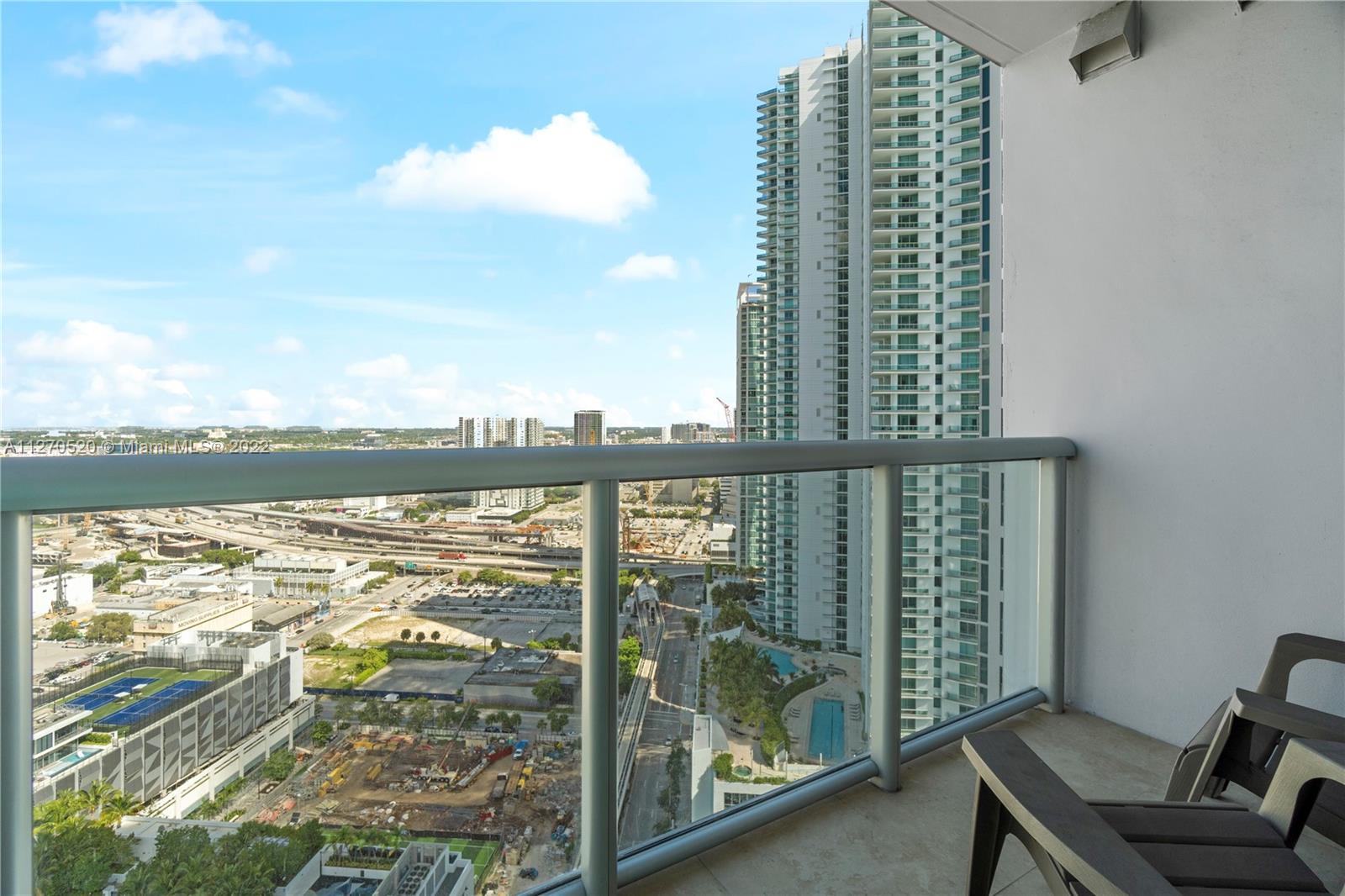888 Biscayne Boulevard, Unit 3301 Miami, FL 33132 - Photo 26 of 29 a view of a balcony with lake view