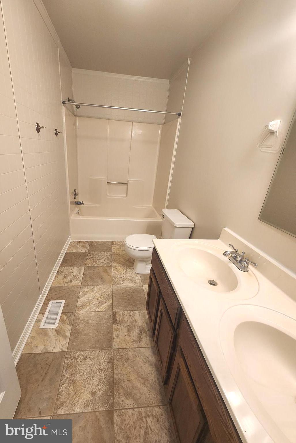 655 Knightsbridge Drive Hagerstown, MD 21740 - Photo 26 of 32 a bathroom with a sink and a mirror