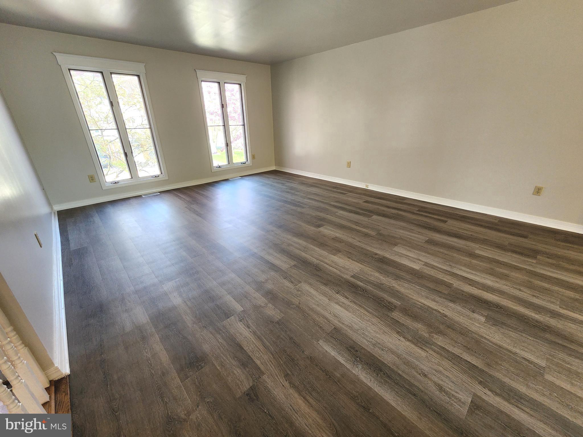 655 Knightsbridge Drive Hagerstown, MD 21740 - Photo 5 of 32 wooden floor in an empty room with a window