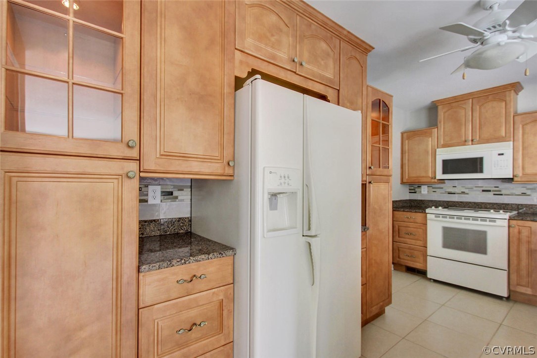 14205 Regatta Pointe Road Midlothian, VA 23112 - Photo 13 of 20 a kitchen with a refrigerator stove and sink